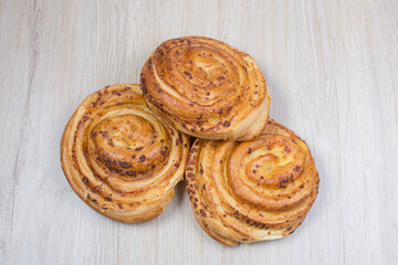 Fresh bakery on light wooden background