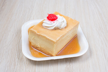 Colorful colorful desserts, made from tropical fruits on wooden background