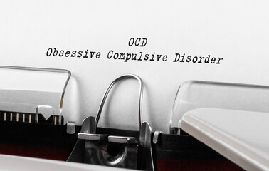 Text OCD Obsessive Compulsive Disorder typed on retro typewriter