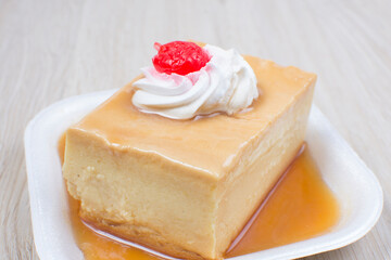 Colorful colorful desserts, made from tropical fruits on wooden background