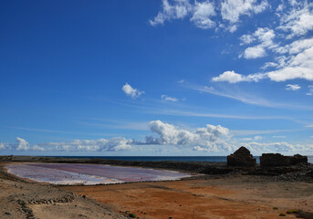 Fototapeta na wymiar Old salt flats, blue sky and some clouds, Salinas de Abajo, south of Gran Canaria, Canary Islands