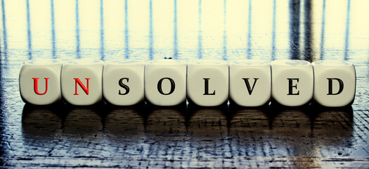 Banner with word solved or unsolved