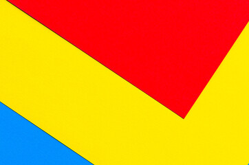 A multi-colored abstract background. Red yellow blue geometric background