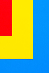 A multi-colored abstract background. Red yellow blue geometric background