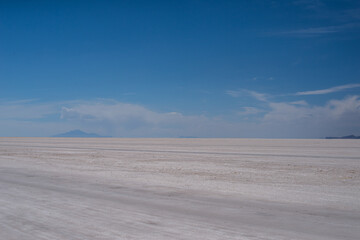 Beautiful Bolivia's Salt Flats. Shot in Salar de Uyuni salt flat. Water reflection of clouds and empty space. 