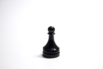 A black chess piece is a pawn isolated on a white background