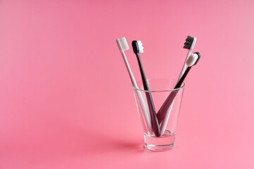 Fashionable toothbrush with soft bristles. Popular toothbrushes. Hygiene trends. Kit of...