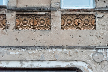 Fototapeta na wymiar Old house with bullet holes, Mostar, Bosnia and Herzegovina