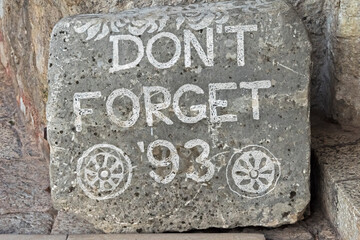 Stone sign, Don't Forget '93, on Stari Most (Old Bridge), a reminder of the war, Mostar, Bosnia and Herzegovina