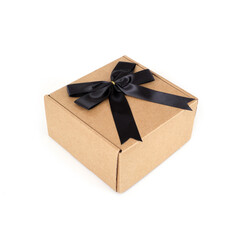 One craft boxes with black bow and ribbon isolated on white background