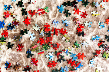 pieces of the puzzle are scattered on the table in different directions