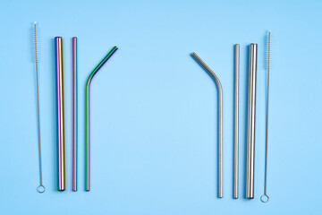 The modern trend towards caring for the environment. Kit of reusable metal beverage straws of...