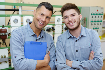 two men looking at camera