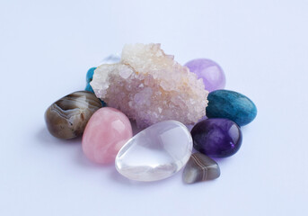 Gems are brightly colored, raw and processed. Cactus amethyst, rose quartz, agate, apatite,...