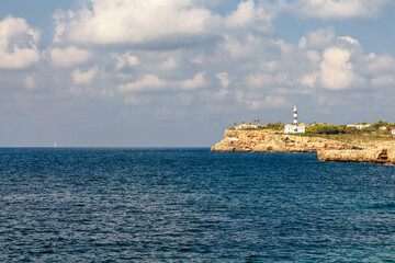 Fototapeta na wymiar Lighthouse at the sea.Mallorca island