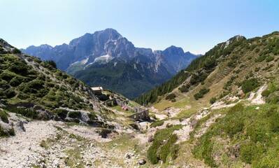 ruins of barracks from the first world war on the slopes of Mount Jof di Miezegnot in the Julian Alps in Italy