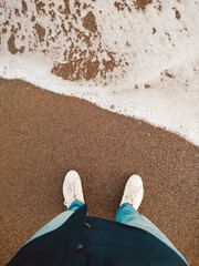 Fototapeta premium Standing by the sea shore
