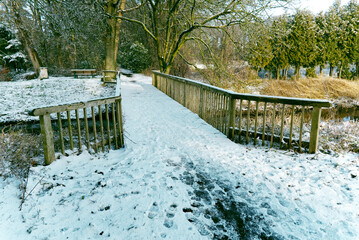 Holzbrücke im Winter in Ocholt