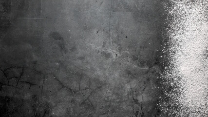 The background is covered with flour. Ingredients for making the dough. Cooking concept. Top view.