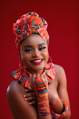 portrait of beautiful smiling nigerian woman in traditional outfit