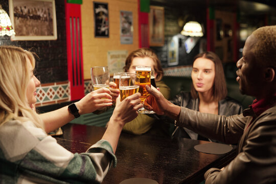 Friends drinking beer during meeting