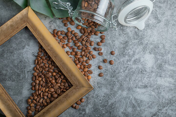 Coffee beans with frame on a gray background