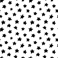 Hand drawn vector seamless star pattern. Black ink illustration. Starry black painted ornament. Monochrome abstract and polka dot vector texture. Pattern for wrapping paper, prints, web design