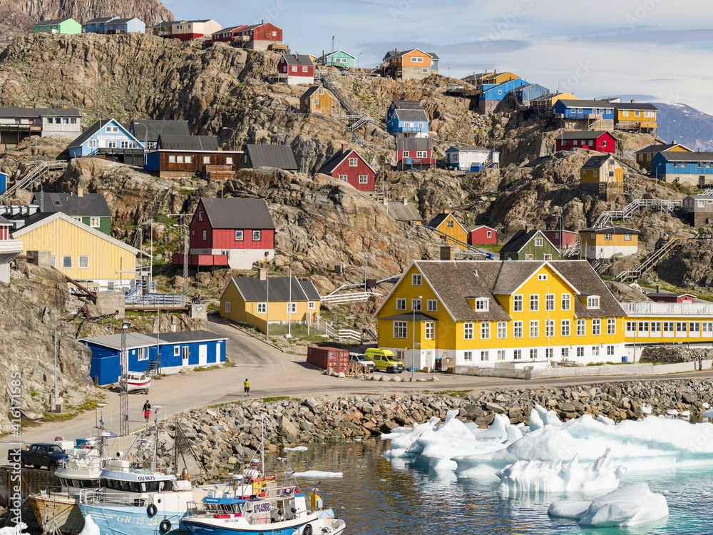 Wall mural uummannaq harbor and town, northwest of greenland, located on an island in the uummannaq fjord syste