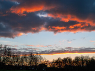 Fototapeta na wymiar Spectacular sun set sky. Rich blue and red tones. Nature background