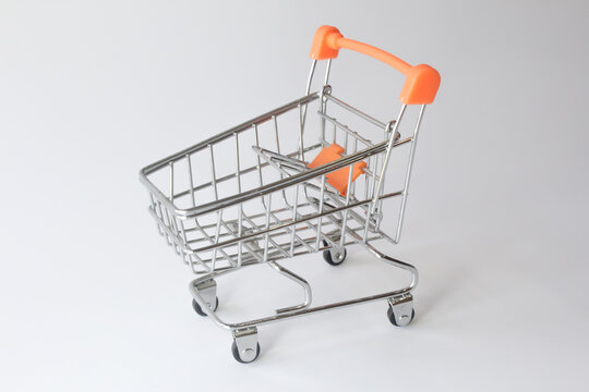 Supermarket shopping cart isolated on white