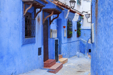 View of the blue walls of Medina quarter in Chefchaouen, Morocco. The city, also known as Chaouen is noted for its buildings in shades of blue and that makes Chefchaouen very attractive to visitors.