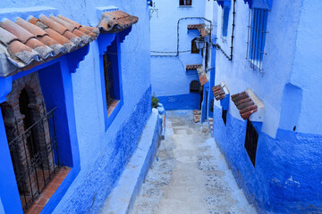 View of the blue walls of Medina quarter in Chefchaouen, Morocco. The city, also known as Chaouen is noted for its buildings in shades of blue and that makes Chefchaouen very attractive to visitors.