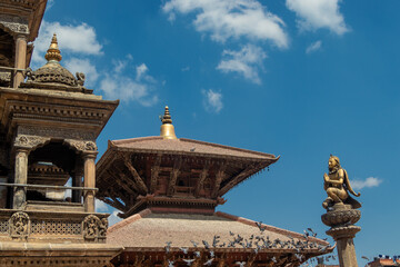 Temples and Garuda on Namaste hand gesture located at Patan Durbar Square, Patan, Nepal the World...
