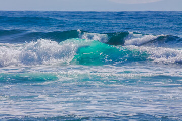 Scenic view of sea waves splashing on shore in Honolulu, Hawaii