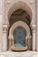 an ablution fountain at hassan ii mosque in casablanca, morroco