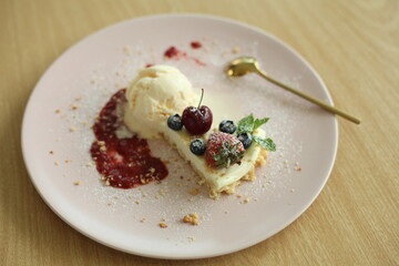 cheesecake with berries and cream