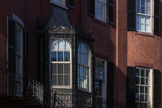 old brick building with iron details