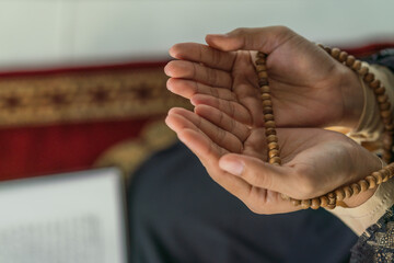 hands of muslim prayer woman with rosary in dua praying for allah blessing