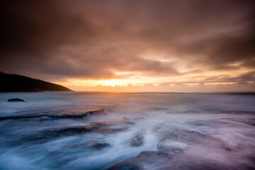 Naklejka premium Sunrise View of Pretty Beach in Murramarang National Park