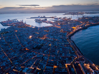 Aerial view of illuminated Cadiz town at early morning, Andalusia, Spain