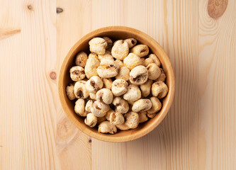 Jumbo corn baked goods on a wooden background
