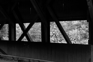 Looking outside from a covered bridge