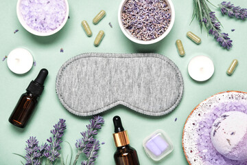 Sleep mask and lavender products for healthy sleep on textile background. Healthy night sleep concept