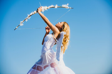 Naklejka premium Angel woman with white wings. Cupid bow and arrow. Sweet angelic girl. Valentines day.
