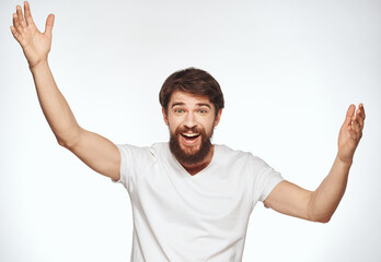 Energetic man on white background gesturing with hands cropped view