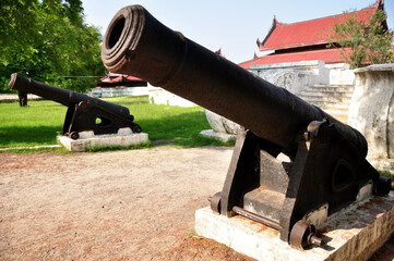 Ancient Cannon or ruins artillery at front of Mandalay Palace the last Burmese monarchy Royal...
