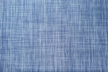 A view of a blue colored abstract criss cross woven design, as a background. - obrazy, fototapety, plakaty