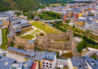 Fototapeta premium Aerial panoramic view of small Spanish city of Ponferrada overlooking ancient Templar castle