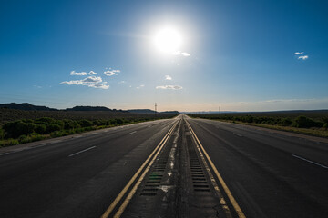 Empty highway asphalt road and beautiful sky sunset landscape. Landscape scene and sunrise above road.
