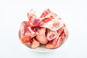 Freshly cut yak bone on white background